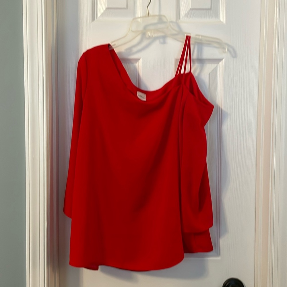 Size M red off the shoulder top. Perfect for the holiday season!